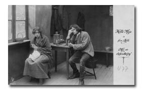 Hella Moja, am Fenster sitzend + ?